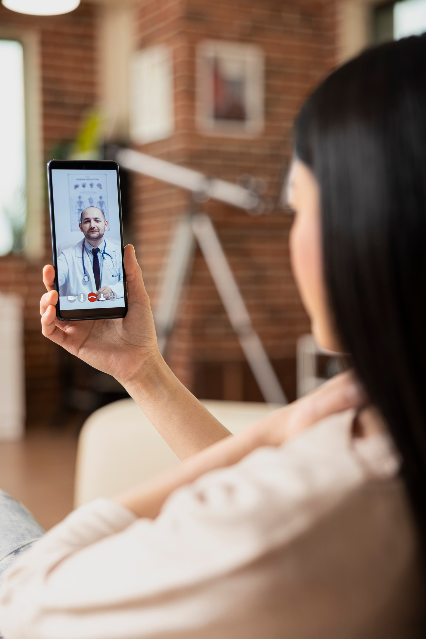 Patient having a virtual healthcare consultation with a doctor